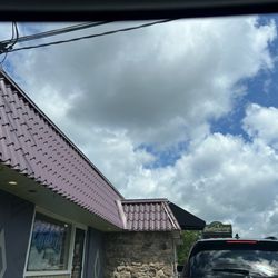 Chillin Drive Thru - Drive through window for Chillin Drive Through with North Park Lounge sign in the background