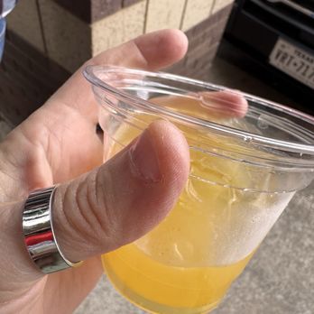 Interstellar BBQ - Complimentary rum punch while waiting in line- yum! - Barbeque Near Me - Austin, Texas