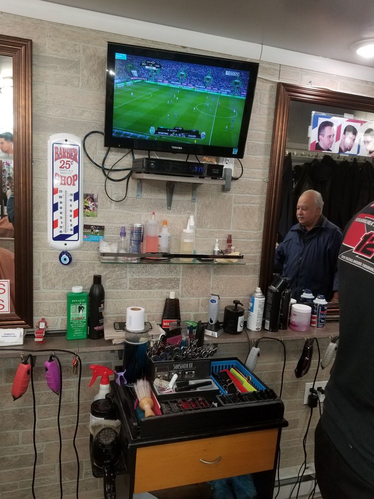 Robert's Barber And Styling Logo