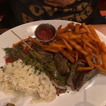 Maggie McFly's | Springfield - Certified Angus Beef Carne Asada Hanger Steak with Asiago Mashed Potatoes and Sweet Potato Fries - American Near Me - Springfield, Virginia