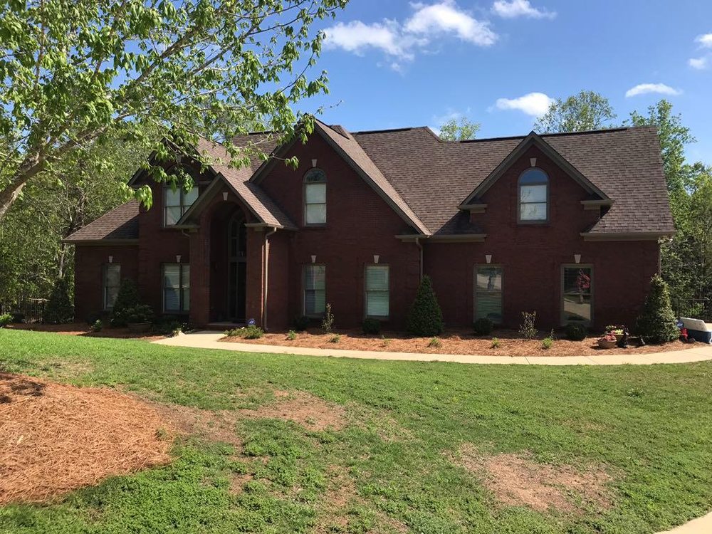 Slide of Legacy Roof Contractors