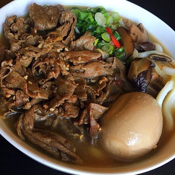 Beyond The Bowl - Niku Udon Soup comes with ribeye beef, green onions, shitake mushrooms, pickled ginger, and egg. - Poke Near Me - Seattle, Washington Beyond The Bowl - Niku Udon Soup comes with ribeye beef, green onions, shitake mushrooms, pickled ginger, and egg. - Poke Near Me - Seattle, Washington