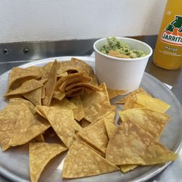 Guac and chips. Mango Jarrito Guac and chips. Mango Jarrito