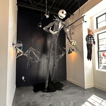 Vampire Penguin - a skeleton hanging from the ceiling - Desserts Near Me - Cumming, Georgia