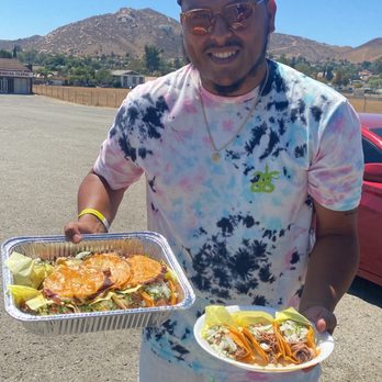 Tocayo Birrieria - My lovely husband holding us down with a family plate and some birria tacos - Tacos Near Me - Riverside, California