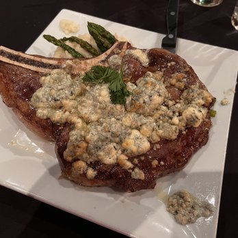 Rosaliano’s - 28oz Bone-in Ribeye done Black &blue Style over garlic mashed potatoes - Italian Near Me - Childs, Pennsylvania Rosaliano’s - 28oz Bone-in Ribeye done Black &blue Style over garlic mashed potatoes - Italian Near Me - Childs, Pennsylvania