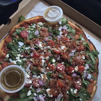 Riko's Pizza - Spinach Salad Pizza - Pizza Near Me - Levittown, New York Riko's Pizza - Spinach Salad Pizza - Pizza Near Me - Levittown, New York