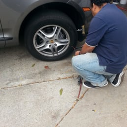 The other guy plugging the tire. The other guy plugging the tire.