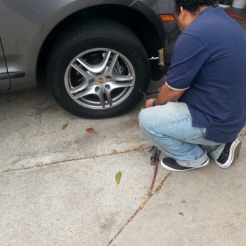 Mavis Tires & Brakes - The other guy plugging the tire. - Tires Near Me - Newton, Massachusetts Mavis Tires & Brakes - The other guy plugging the tire. - Tires Near Me - Newton, Massachusetts