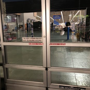 Walmart Supercenter - a woman walking through the store - Grocery Near Me - Buda, Texas