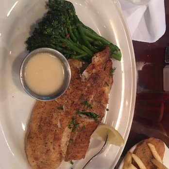 Pappadeaux Seafood Kitchen - Mahi mahi with lemon caper sauce and broccolini - Cajun/Creole Near Me - Austin, Texas Pappadeaux Seafood Kitchen - Mahi mahi with lemon caper sauce and broccolini - Cajun/Creole Near Me - Austin, Texas