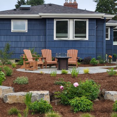 Northwest Norwegian in Mt. Tabor - Taking inspiration from the homeowner’s Norwegian heritage and mid-century modern style, this landscape is meant to be enjoyed year round. The bluestone patios and paths are visually connected by an garden of northwest native pollinators, a waterfall, an outdoor family room and a raised bed vegetable garden. All while leaving a large grass yard for the dogs to enjoy! The cedar barrel sauna fits right in. Northwest Norwegian in Mt. Tabor - Taking inspiration from the homeowner’s Norwegian heritage and mid-century modern style, this landscape is meant to be enjoyed year round. The bluestone patios and paths are visually connected by an garden of northwest native pollinators, a waterfall, an outdoor family room and a raised bed vegetable garden. All while leaving a large grass yard for the dogs to enjoy! The cedar barrel sauna fits right in.