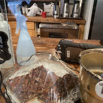Red Umbrella Cafe - a tray of pecans and a cup of coffee - Breakfast & Brunch Near Me - Vancouver, British Columbia
