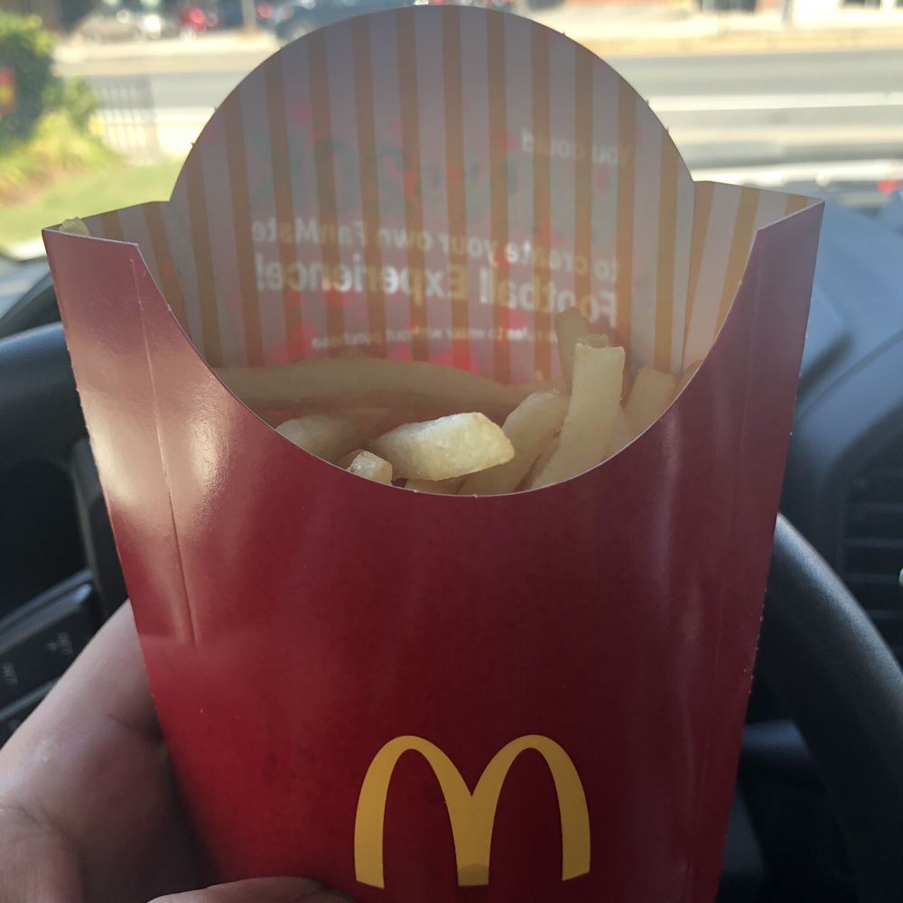 This is a large fry, and no there is no loose fries in the bottom of the bag. 3.75 for this