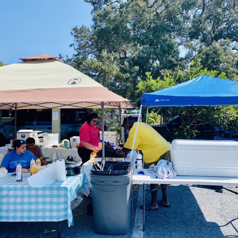 Patmon’s Barbeque - a group of people under a tent - Barbeque Near Me - Dunedin, Florida Patmon’s Barbeque - a group of people under a tent - Barbeque Near Me - Dunedin, Florida