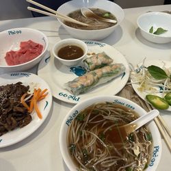 Pho' 99 - Grilled Pork Slices, Shrimp Salad Rolls, Steak Pho with steak slices raw on side