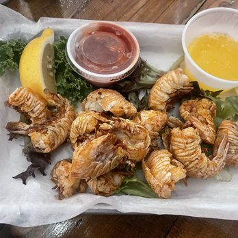Picketts Seafood - Steamed rock shrimp, steamed in butter and old bay! - Bars Near Me - New Smyrna Beach, Florida Picketts Seafood - Steamed rock shrimp, steamed in butter and old bay! - Bars Near Me - New Smyrna Beach, Florida