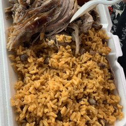 Cibao Kitchen - Pork shoulder and yellow rice