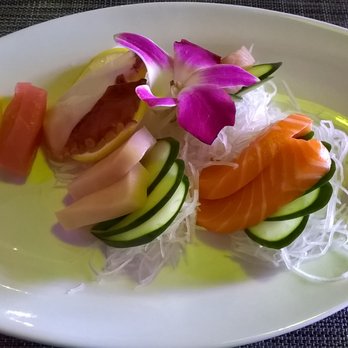 GreenGinger - Sashimi with 10 pcs of fish: pink tuna, Octopus, white tuna, yellowfin tuna, and salmon (l to r) with cucumber and shredded white carrot - Sushi Bars Near Me - Greenwood, Indiana GreenGinger - Sashimi with 10 pcs of fish: pink tuna, Octopus, white tuna, yellowfin tuna, and salmon (l to r) with cucumber and shredded white carrot - Sushi Bars Near Me - Greenwood, Indiana