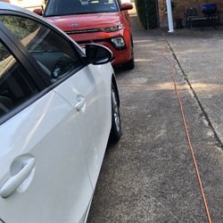 Spectrum - Cable running from my home.. stretching through my driveway into my backyard.