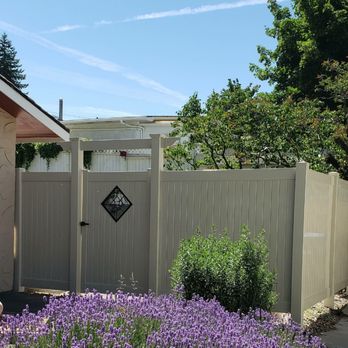 Premier Fencing Installations - Tan Vinyl Fence with simple arbour and gate cutout - Fences & Gates Near Me Premier Fencing Installations - Tan Vinyl Fence with simple arbour and gate cutout - Fences & Gates Near Me