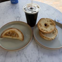 Empanada, toasted bagel w/ cream cheese, and cold brew (no ice)