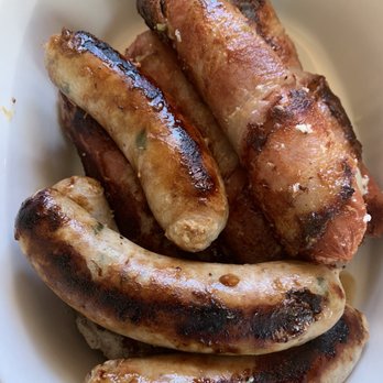 Chase's Chop Shop - hot dogs wrapped in bacon stuffed with pepper jack cheese  Also some chicken habanero sausages called YELLOW HELL! They're spicy! - Butcher Near Me - Madera, California