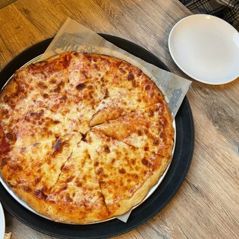 Junior's Bar and Grill - a cheese pizza - American Near Me - Guilderland, New York Junior's Bar and Grill - a cheese pizza - American Near Me - Guilderland, New York