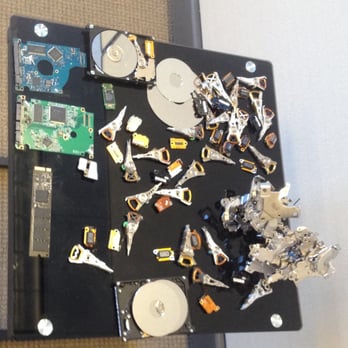 Kotar Data Recovery - A display of SSD parts, drive heads, PCBs and platters in the lobby - Data Recovery Near Me - San Jose, California Kotar Data Recovery - A display of SSD parts, drive heads, PCBs and platters in the lobby - Data Recovery Near Me - San Jose, California