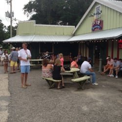 Outdoor waiting. They also have an enclosed, air-conditioned waiting area with full bar service and big screen TV.