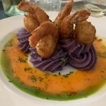 Kula Bistro - Coconut shrimp on purple sweet potatoes. The sauce is soooooo good. - Italian Near Me - Kula, Hawaii Kula Bistro - Coconut shrimp on purple sweet potatoes. The sauce is soooooo good. - Italian Near Me - Kula, Hawaii