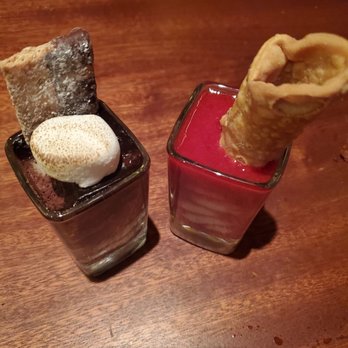 Seasons 52 - Triple chocolate with toasted marshmallow and chocolate chip cannoli w raspberry sauce and cheesecake - New American Near Me - Phoenix, Arizona