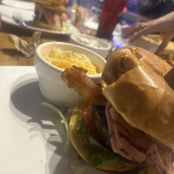 Bluffs - Flyin Hawaiian with Mac n cheese. So good the pineapple and ham went so well with the burger. The flavor in the burger alone was amazing. - Bars Near Me - Sevierville, Tennessee