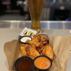 Buffalo Wild Wings - Traditional Dry Buffalo seasoning, mango habanero, and Hot Buffalo on the side. Ice cold Wild Heard.