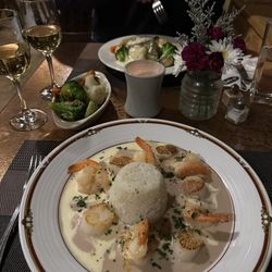 Bistro 42 - Shrimp and scallop with beurre blanc and beurre rouge sauce at front; Pan seared flounder in back