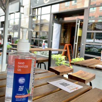 Jiang Nan - Hand sanitizer provided on each table - Chinese Near Me - Flushing, New York
