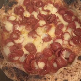 Pepperoni pizza with cup char pepperonis Pepperoni pizza with cup char pepperonis