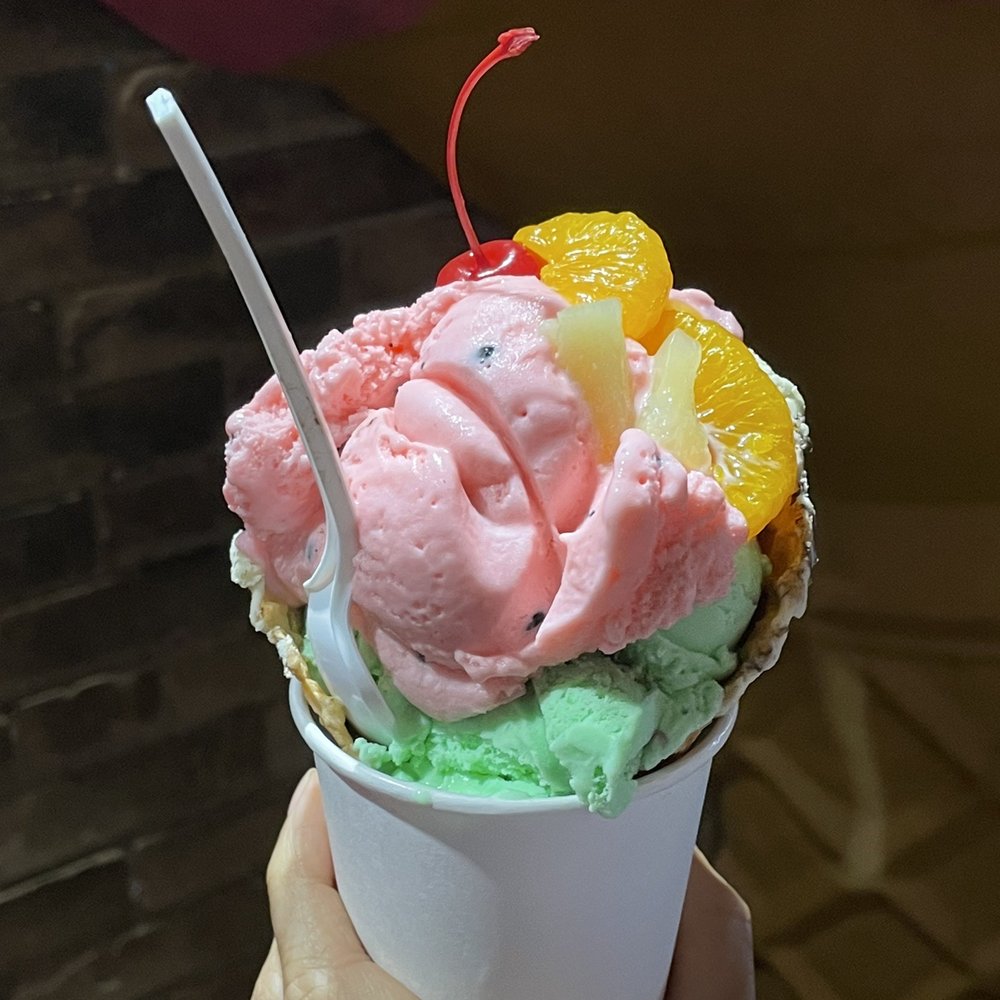 Dutch Dreams - Social distance cone ($9.75 for two scoops); watermelon sherbet and pistachio almond crunch - Ice Cream & Frozen Yogurt Near Me - Toronto, Ontario Dutch Dreams - Social distance cone ($9.75 for two scoops); watermelon sherbet and pistachio almond crunch - Ice Cream & Frozen Yogurt Near Me - Toronto, Ontario