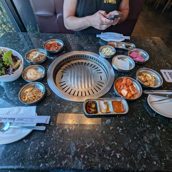 Oo-Kook Korean BBQ - Just sat, haven't ordered and look at this spread!! Delicious and sincerely feels great in your stomach. ‍ - Korean Near Me - Los Angeles, California