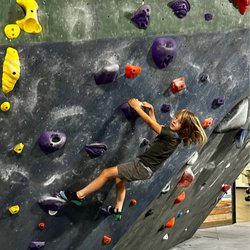 RockFish Climbing & Fitness - The walls like this which are harder than the smaller walls, he didn't get very far up the wall.