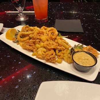 SoBe Restaurant and Lounge - Only a 3rd of the plate is calamari. The rest is fried peppers. - American Near Me - Lanham, Maryland SoBe Restaurant and Lounge - Only a 3rd of the plate is calamari. The rest is fried peppers. - American Near Me - Lanham, Maryland