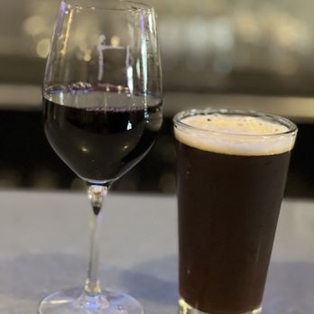 Ten10 Brewing Co - a glass of wine and a glass of beer - Sandwiches Near Me - Orlando, Florida Ten10 Brewing Co - a glass of wine and a glass of beer - Sandwiches Near Me - Orlando, Florida