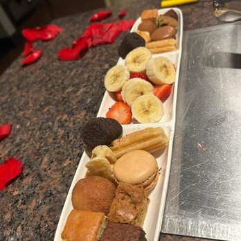 The Melting Pot - Dessert accompaniments. The donut, churro and waffle were VERY stale. Macaroons were delicious. - Fondue Near Me - Downers Grove, Illinois The Melting Pot - Dessert accompaniments. The donut, churro and waffle were VERY stale. Macaroons were delicious. - Fondue Near Me - Downers Grove, Illinois