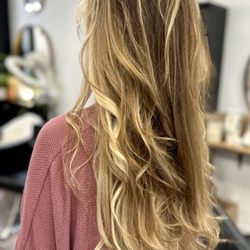 V C & Company Salon - "Sun-kissed balayage waves, done right at V.C. & Company Salon | Gallery in Old Town Bluffton "