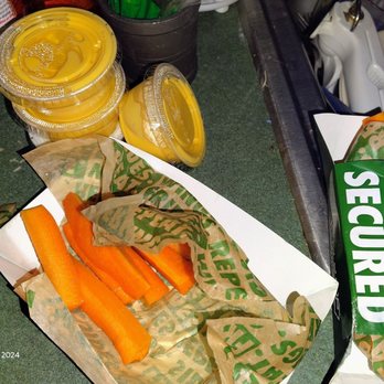 Wingstop - My carrots and all the cheese sauce I got for the french fries I won't eat cuz they're too salty - Chicken Wings Near Me - Clifton Park, New York