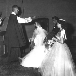St Helena's Church - Msgr. Arthur Scanlan is shown here blessing the marriage of Arthur and Norma Panetta on Sept. 19, 1953.  The Panettas had three children.