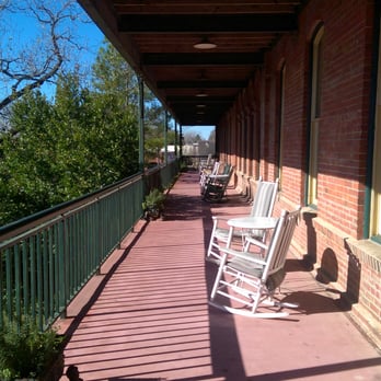 Ant Street Inn - Veranda - Hotels Near Me - Brenham, Texas