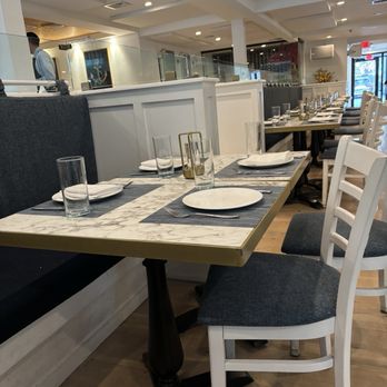Symi Northport - Part of the warm & inviting dining area - Greek Near Me - Northport, New York
