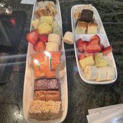 Photo of The Melting Pot - Columbus, OH, United States. The dessert dippers with two candles to celebrate!