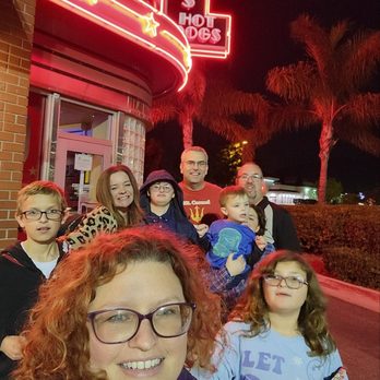 Portillo's Moreno Valley - Family ussie in front of sign. - Burgers Near Me - Moreno Valley, California Portillo's Moreno Valley - Family ussie in front of sign. - Burgers Near Me - Moreno Valley, California